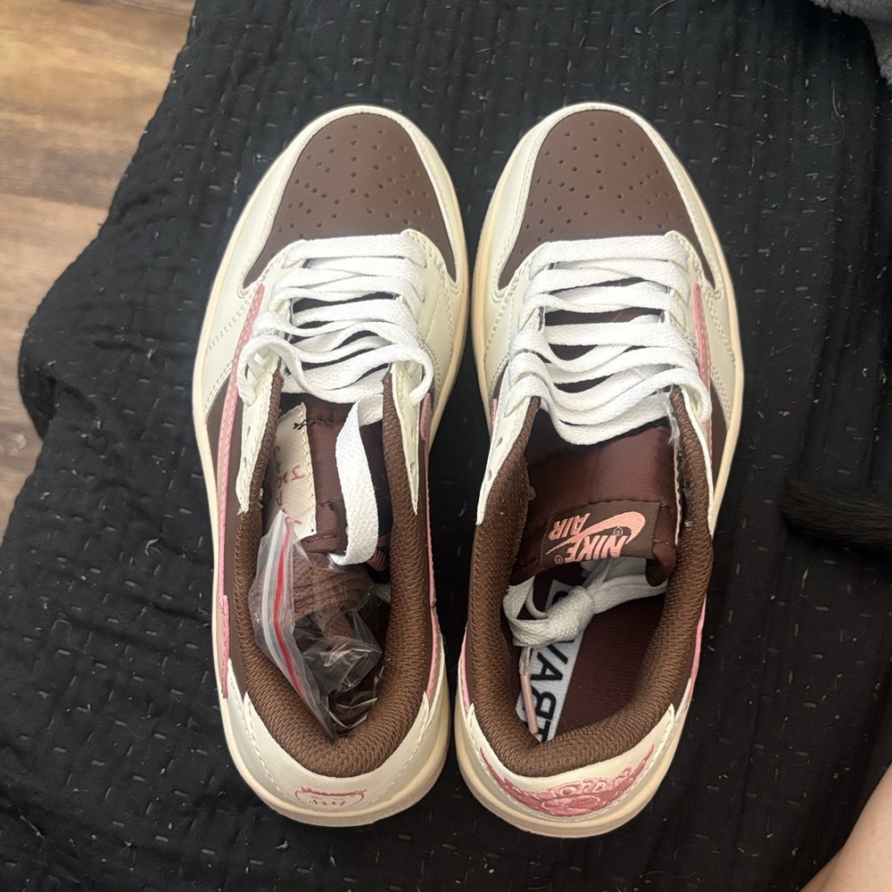 Nike pink brown and white Jordan 1 low sneakers